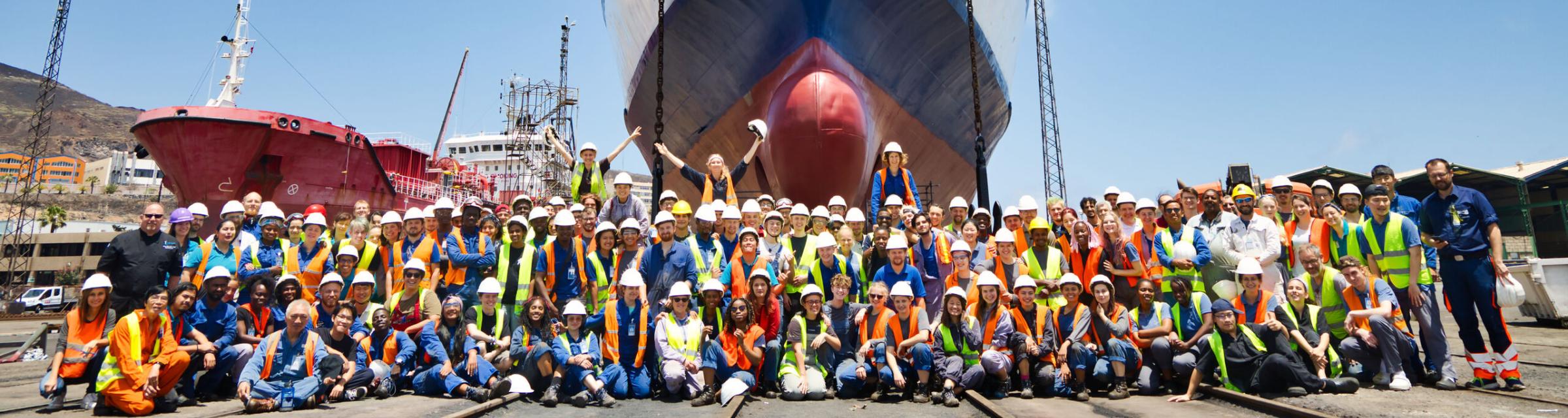 Las Palmas, Canary Islands :: The ship's technical team pose for the annual dry dock picture before the ship is refloated.