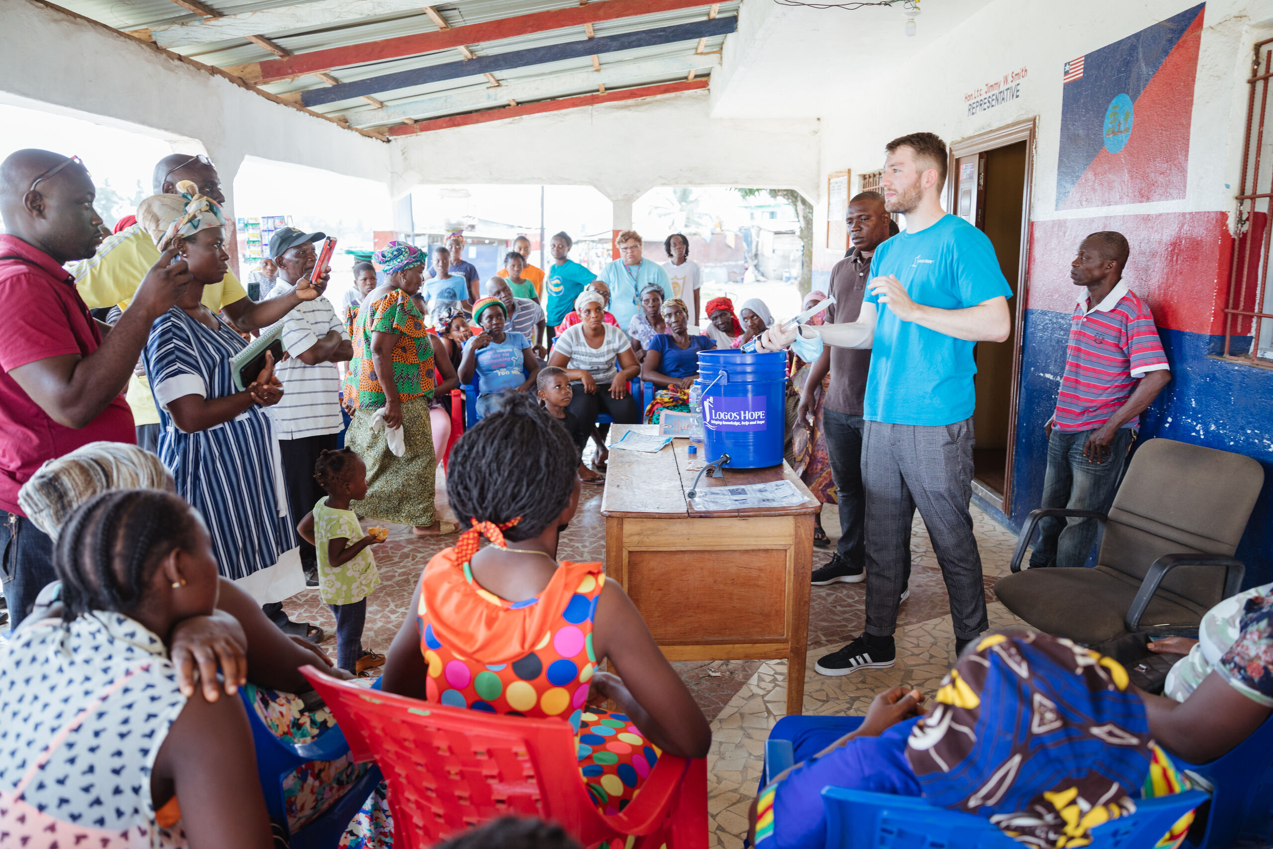 Monrovia, Liberia :: Jan Streitenberger (Germany) explains how to use the water purifiers donated by Logos Hope.